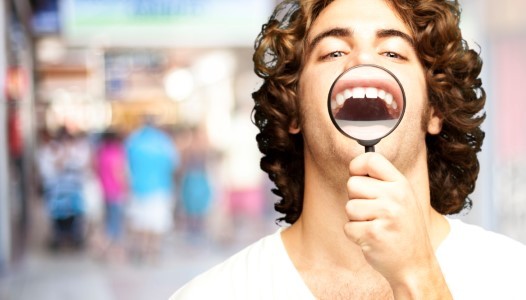 man with magnifying glass
